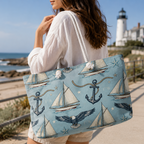 Woman holding a tote bag with nautical designs by a lighthouse.